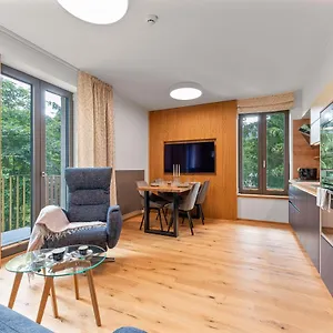 https://residence-koubek-utulny-apartman-s-vyhledem-a-parkovanim.spindleruvmlyn-hotels.com